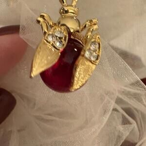 Insect  With Springed Diamond Gold Toned Wings And Cranberry Gem Body Brooch